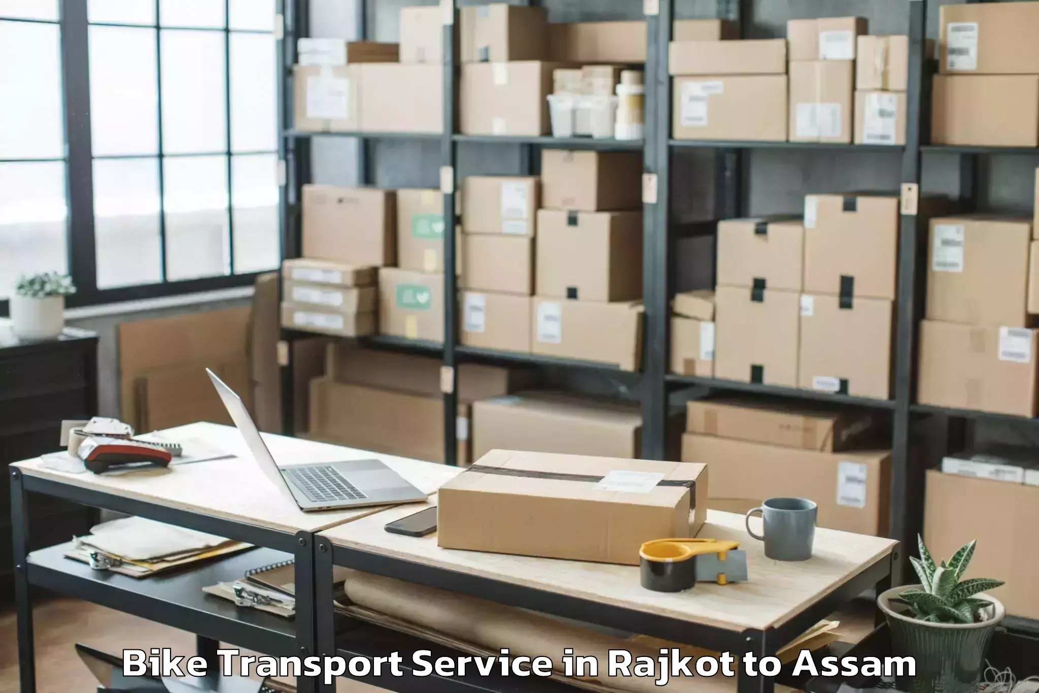 Reliable Rajkot to Bilasipara Bike Transport